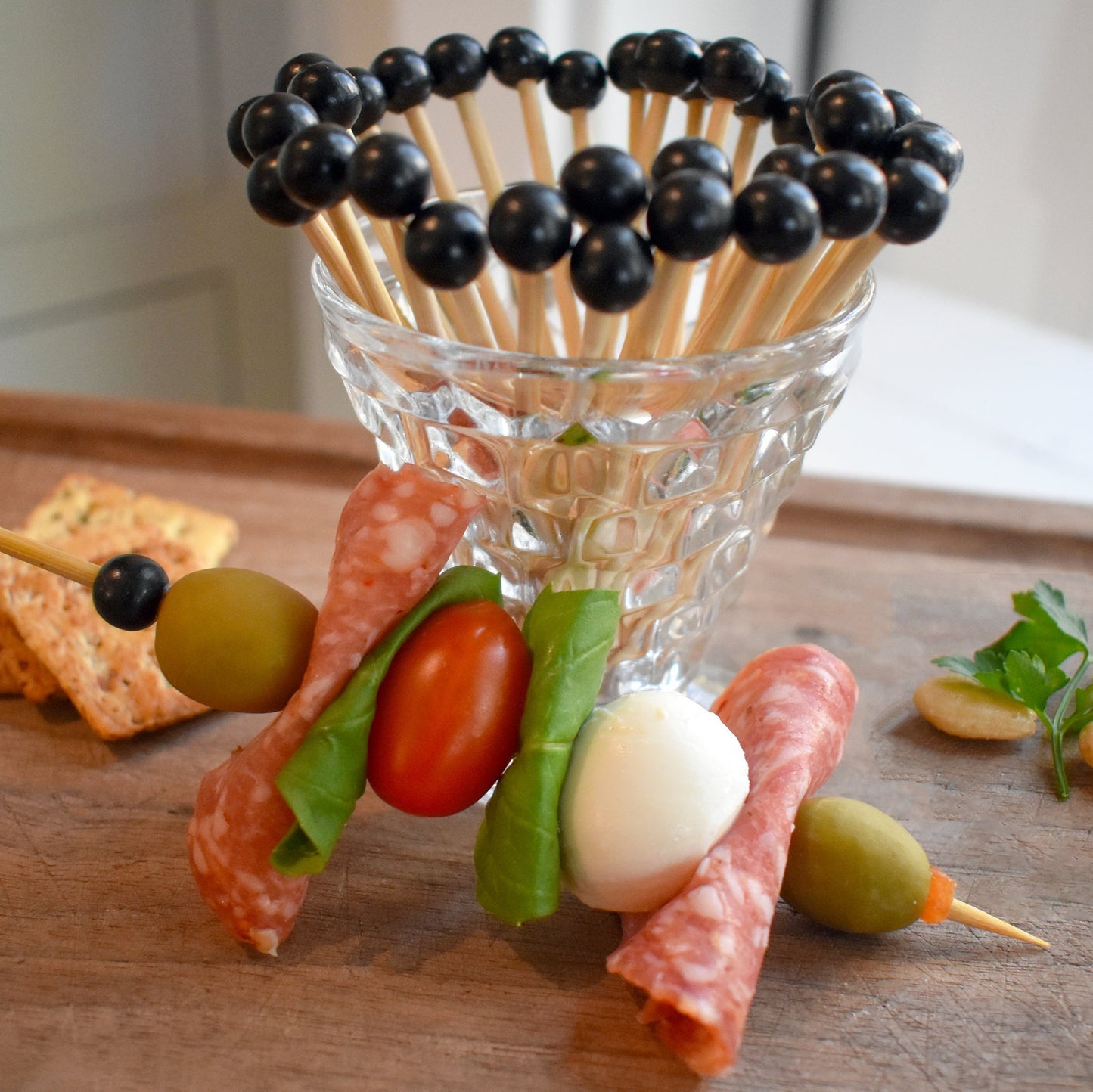 Elegant cocktail and appetizer picks used for champagne garnishes and charcuterie spreads. Perfect for entertaining and special occasions.