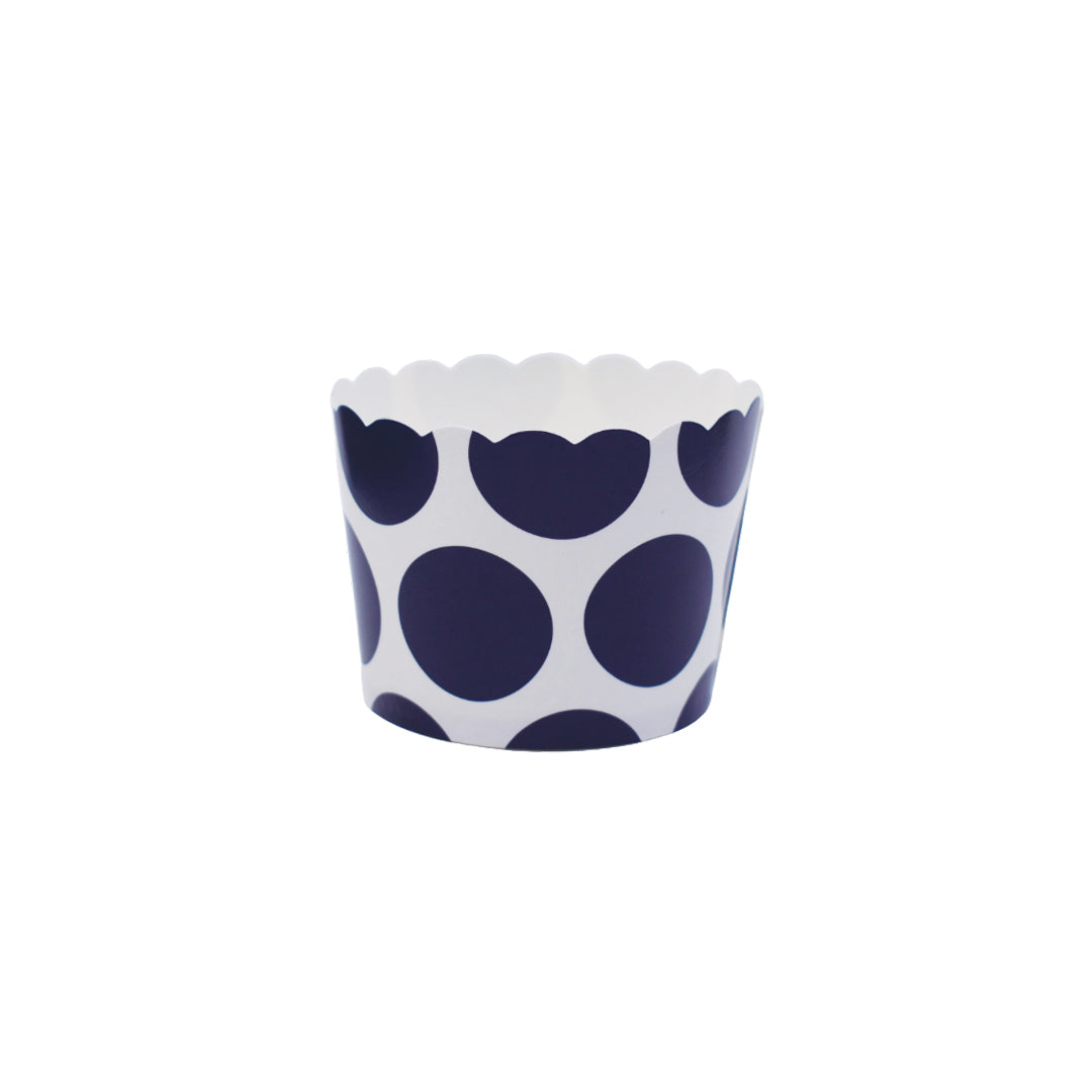 Small blue polka dot paper baking and snack cup, oven-safe, freezer-safe, PFAS-free, perfect for muffins, cupcakes, and snacks, disposable, eco-friendly, and colorful party baking accessory.
